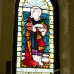 Window in St. Luke's that says: "In Memory of Captain Joseph Bridger The Builder of this Church"